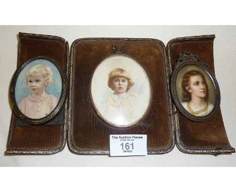 Edwardian cased portrait miniature of a child, another signed miniature of a child and metal framed miniature portrait of a y