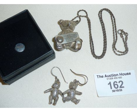 A 925 Sterling Silver Steiff Teddy Bear Club brooch on silver necklace, pair of jointed Teddy Bear earrings and a Steiff stud