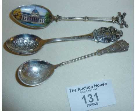 Three silver souvenir spoons, one marked Rolex Watches, J.S. Kaufmann of Berlin and another with painted enamel bowl depictin