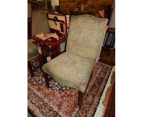 A pair of George III style side chairs having foliate tapestry woven upholstery raised on chamfered square legs      . 