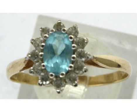 9ct gold aquamarine and clear stone set ring, size O, 1.5g. P&amp;P Group 1 (£14+VAT for the first lot and £1+VAT for subsequ