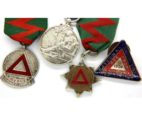 Two Safe Driving medals, one NSFA driving badge and a service medal. P&amp;P Group 1 (£14+VAT for the first lot and £1+VAT fo