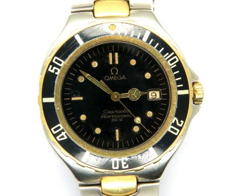 Omega Seamaster; professional 200m divers wristwatch, 18ct gold bevel and overlay inserts on stainless steel strap and black 