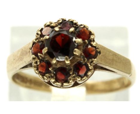 9ct gold daisy cluster ring set with nine red stones, size L/M, 2.0g. P&amp;P Group 1 (£14+VAT for the first lot and £1+VAT f