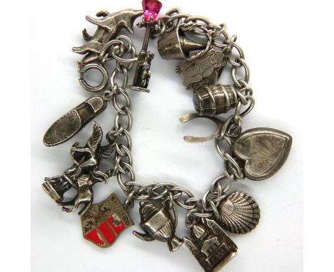 925 silver charm bracelet with fourteen charms, L: 21 cm, combined 35g. P&amp;P Group 1 (£14+VAT for the first lot and £1+VAT