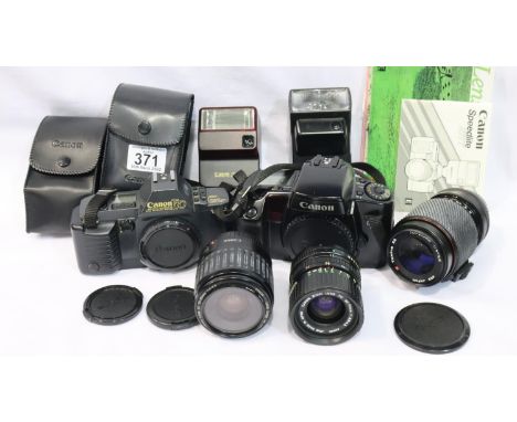 Canon T70 35 mm SLR camera body, Canon EOS 100 SLR camera body with mixed Canon lenses and flashes. P&amp;P Group 3 (£25+VAT 