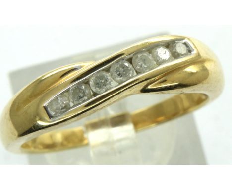 18ct gold channel set diamond ring, size R, 4.2g. P&amp;P Group 1 (£14+VAT for the first lot and £1+VAT for subsequent lots) 