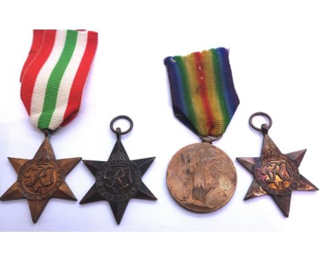 Three British WWII stars including the Italy star and a 1939-45 star and a WWI medal inscribed to A.W Wall A.B R.N. P&amp;P G