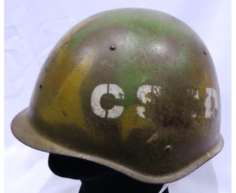 Vietnam War period Russian steel helmet, used by the North Vietnam army, finished in camouflage colours with lettering still 