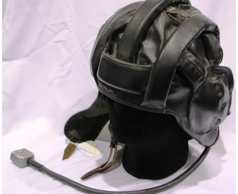 An East German pilots helmet with headphone cord. P&amp;P Group 2 (£18+VAT for the first lot and £3+VAT for subsequent lots) 