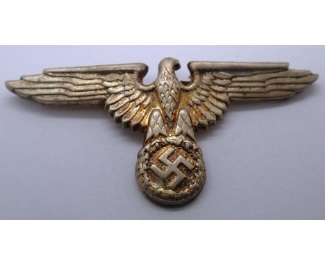 Later WWII period German cap eagle in pressed metal. P&amp;P Group 1 (£14+VAT for the first lot and £1+VAT for subsequent lot