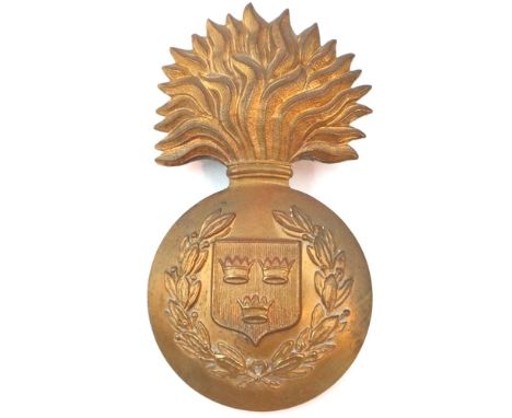 Royal Munster Fusiliers WWI bearskin badge together with Connaught Rangers badge and two further badges. P&amp;P Group 1 (£14