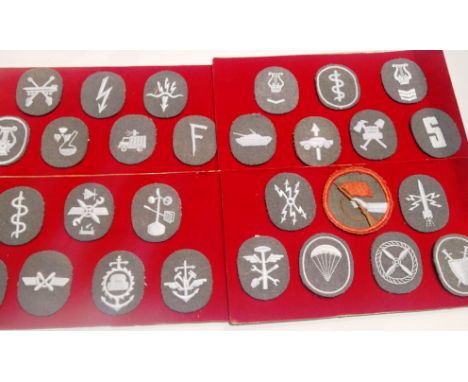 Collection of board mounted East German Division patches (28). P&amp;P Group 1 (£14+VAT for the first lot and £1+VAT for subs