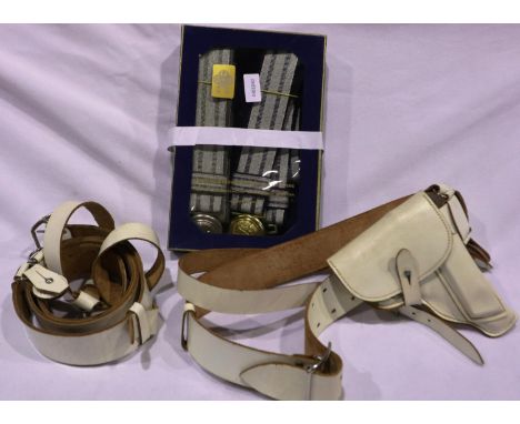 East German parade belts, one with holster (4). P&amp;P Group 3 (£25+VAT for the first lot and £5+VAT for subsequent lots) 