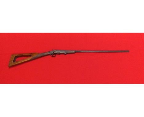 A .410 folding shotgun with skeleton stock, S/No.18 (black powder proof only), this item can only be purchased by someone wit