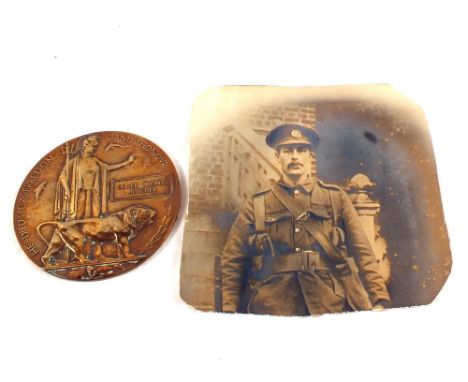 A WWI memorial plaque to Oliver Thomas Butcher, Service No.12525 Suffolk Regiment, K.I.A. 08.03.17, grave ref. 111.E.22, Faub