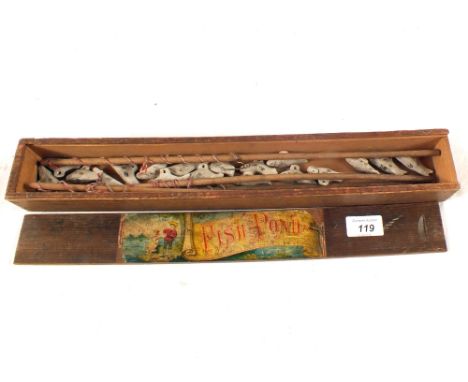 A boxed German fish pond game with bisque fish, c1910