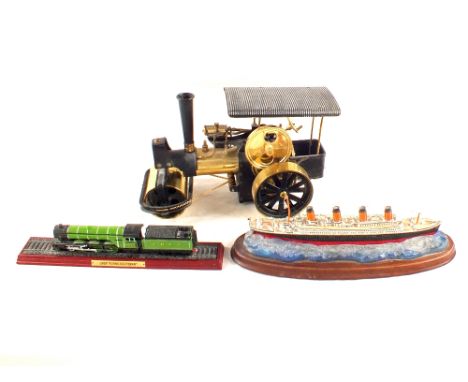 Boxed Wilesco steam roller traction engine plus a model boat and train