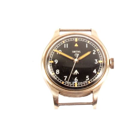 A military watch by Smiths, black face with luminous hands and Broad Arrow marked
