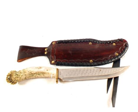 A Bowie knife, approx 16", by Silver Stag U.S.A., with stag grip and leather scabbard, also marked Silver Stag U.S.A.