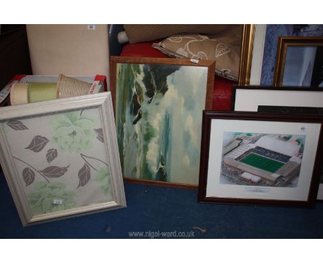 Three prints of a football stadium, floral and seascape.