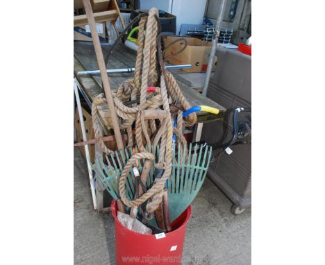 A quantity of garden tools to include; spade, forks, etc.