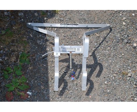 A metal ladder stand off
