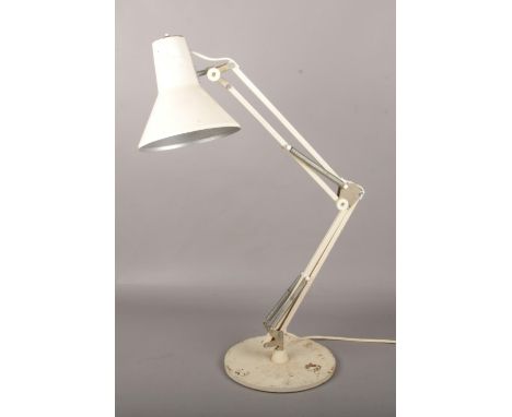 A vintage cream anglepoise desk lamp.  