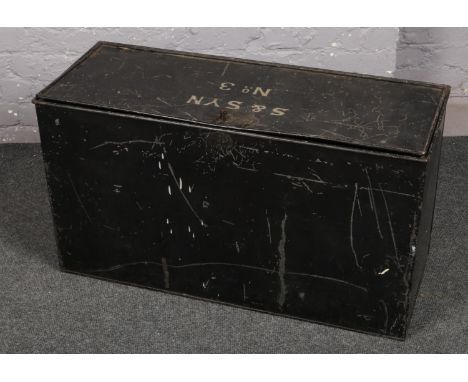A black painted tin trunk, stencilled S&amp;SYN No.3.  