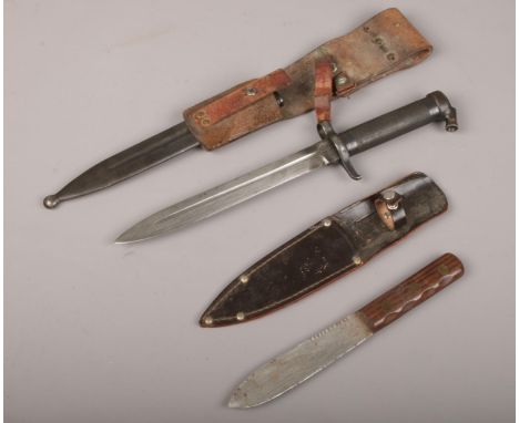 A World War II Swedish M96 Mauser bayonet with metal scabbard and leather frog and a Green River hunting knife, Sheffield mad