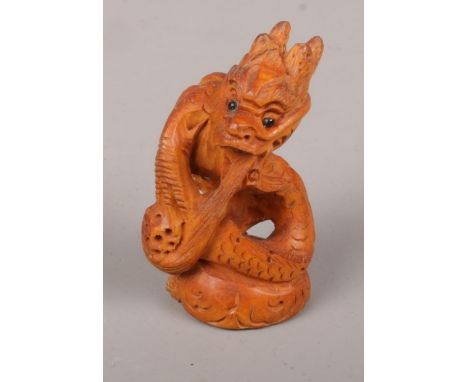 A box wood Japanese Netsuke dragon (approx 5 cm height)  