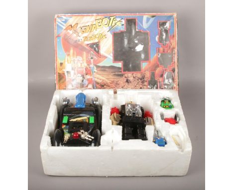 A boxed MagnaBotix and JetaBotix battery operated robot set.  