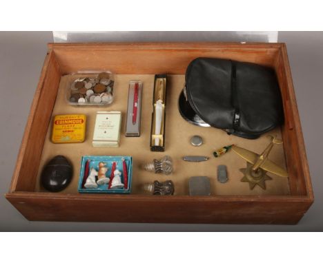 A bijouterie case of collectables, to include coins, cap with constable badge, pen knives etc.  