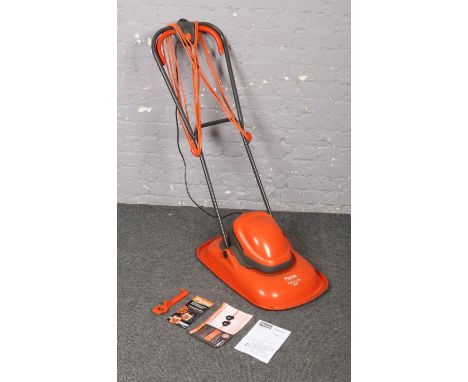 A Flymo Turbo Lite 330 electric hover lawn mower. With instructions and spanner.  Used but in excellent condition.