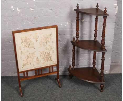 A oak embroided  silk fire screen along with a mahogany three tier corner whatnot stand.  