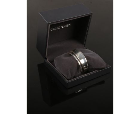 A Georg Jensen boxed silver bangle.  