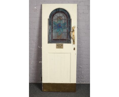 A pine public house door. With stained glass panel and Art Nouveau brass handles, 192.5cm x 75.5cm. Provenance; Lathom Hall, 