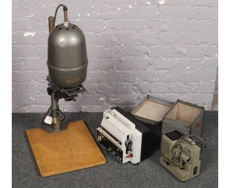 A Master II enlarger along with a Eumig mark S 807 D projector and another cased projector.  