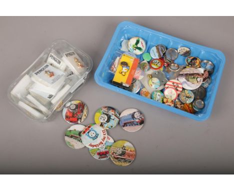 A collection of badges, to include enamel examples.  