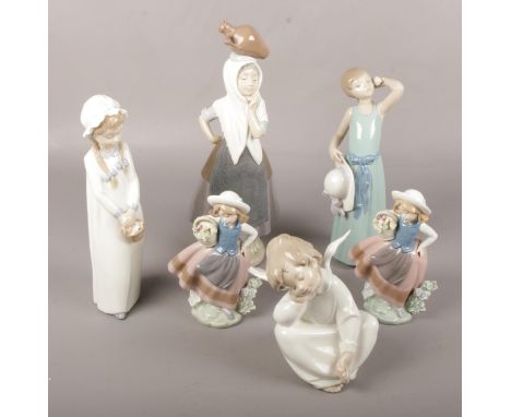A collection of Lladro &amp; Nao ceramic figures, 4961 Angel dreaming, girls with flower basket, lady with jug on head exampl