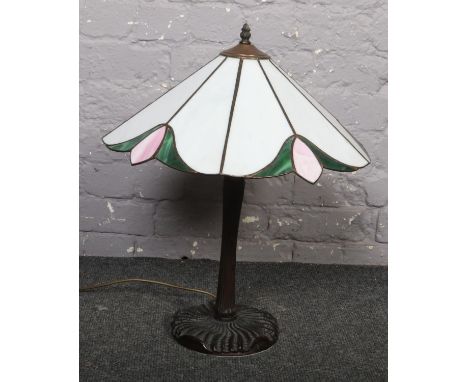 A Tiffany style table lamp with stained glass shade  