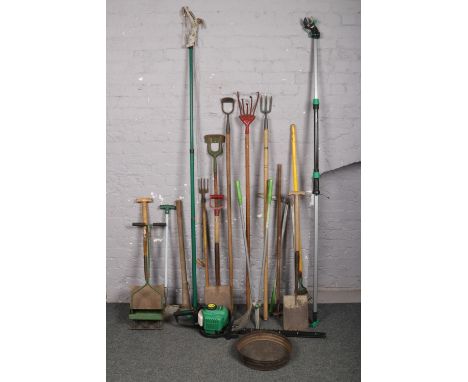 A collection of garden tools to include petrol gardenlite hedge trimmer, shovels, rake, etc.  