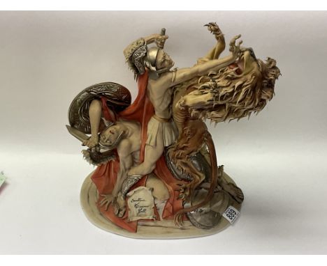 A large porcelain Capodimonte group figure of Spartacus and the Lion, signed Tiziano Galli, 39.5cm. (No visible signs of dama