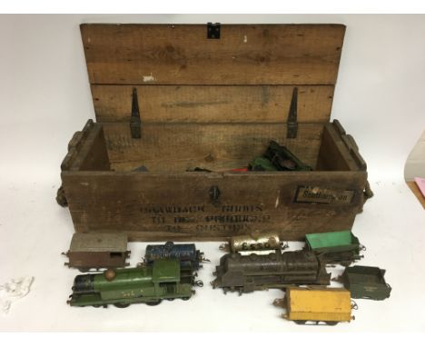 Wooden trunk box of British made vintage toy trains