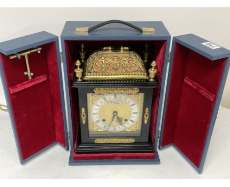 An F. W. Elliott Golden Jubilee clock, modelled in the style of a late 17th century bracket clock, with ormolu mounted ebonis