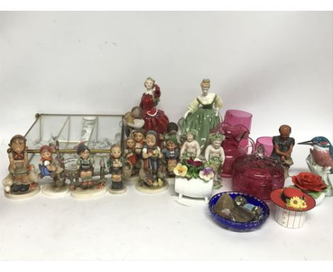 A collection of Hummel figures, Doulton figures and other ceramics