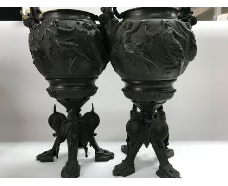 A pair of Victorian bronze oil lamp bases of classical form.