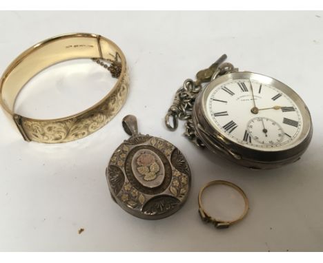 A silver cased key wind pocket watch JB Yabsley London with watch chain and seen working a gold metal core bangle a decorativ