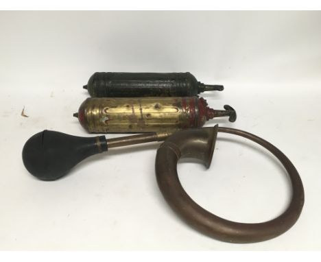 Two vintage car fire extinguishers and brass car horn