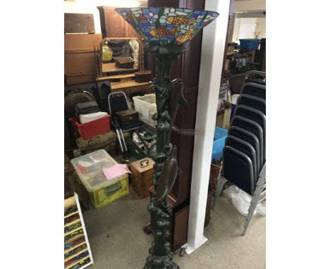 A modern design dolphin stand lamp with shade. Approximately 6ft tall.